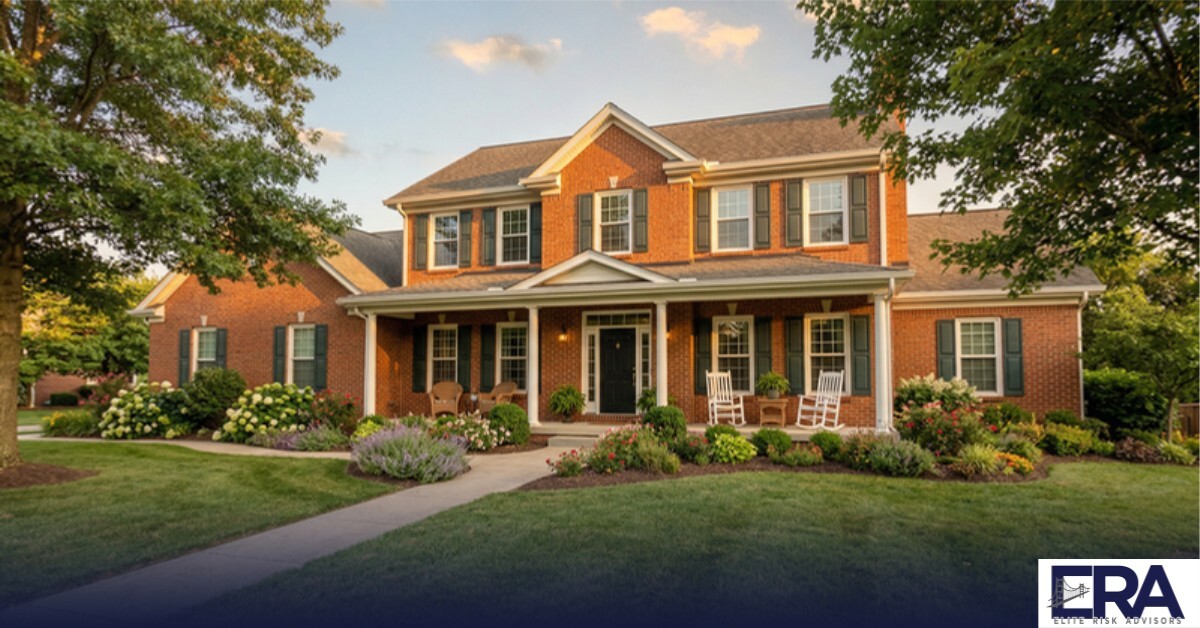Wide-angle view of a classic brick colonial home in Owensboro Kentucky with mature trees and front porch — Daviess County home insurance guide